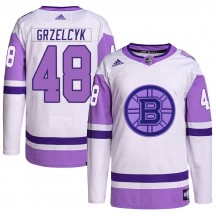 Men's Adidas Boston Bruins Matt Grzelcyk White/Purple Hockey Fights Cancer Primegreen Jersey - Authentic
